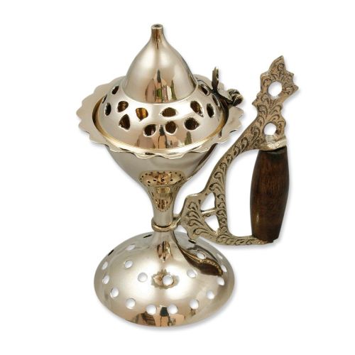 Brass smoking vessel with wooden handle